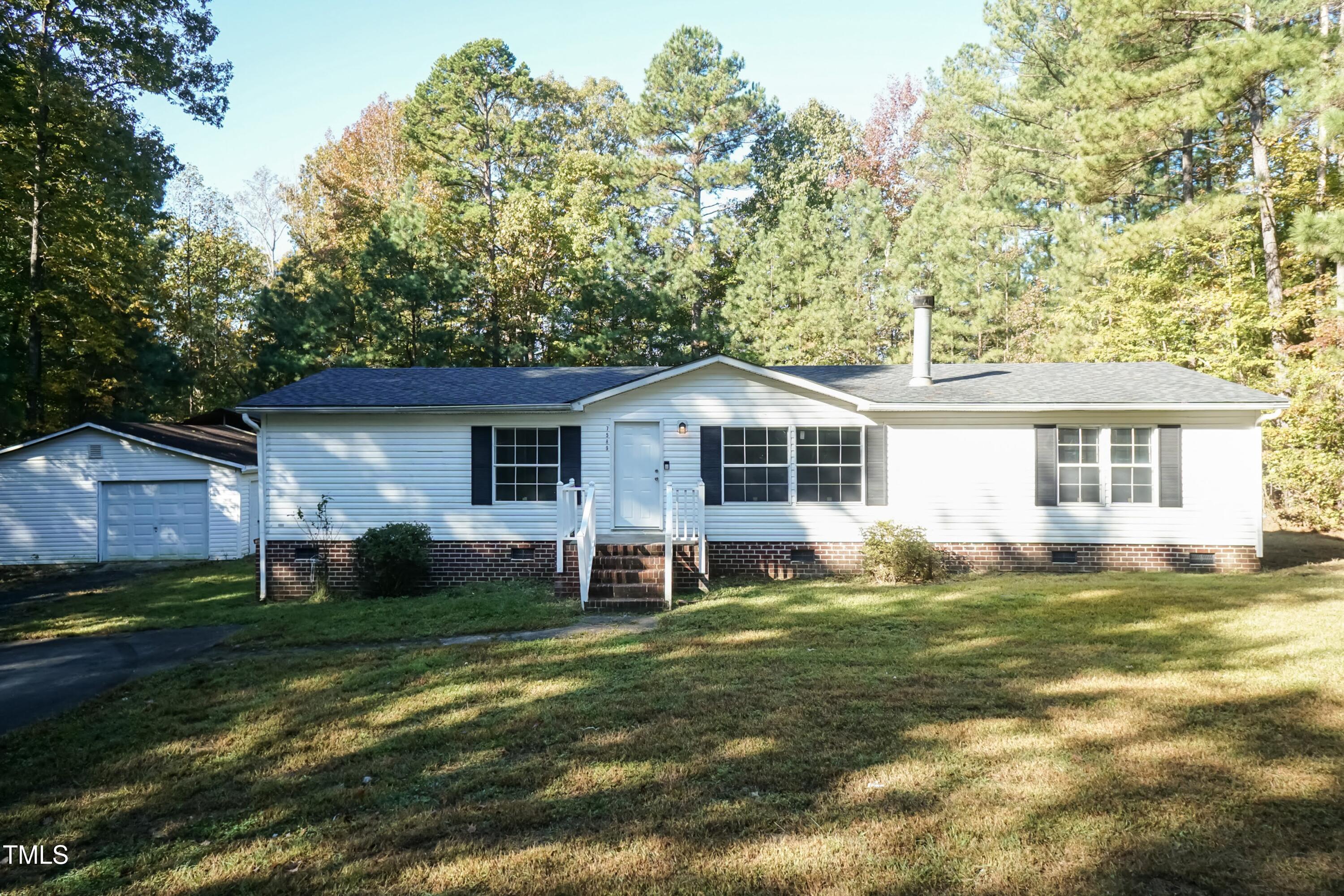 7589 Sam Hall Road Oxford, NC 27565 - Photo 3 of 40 Front 02