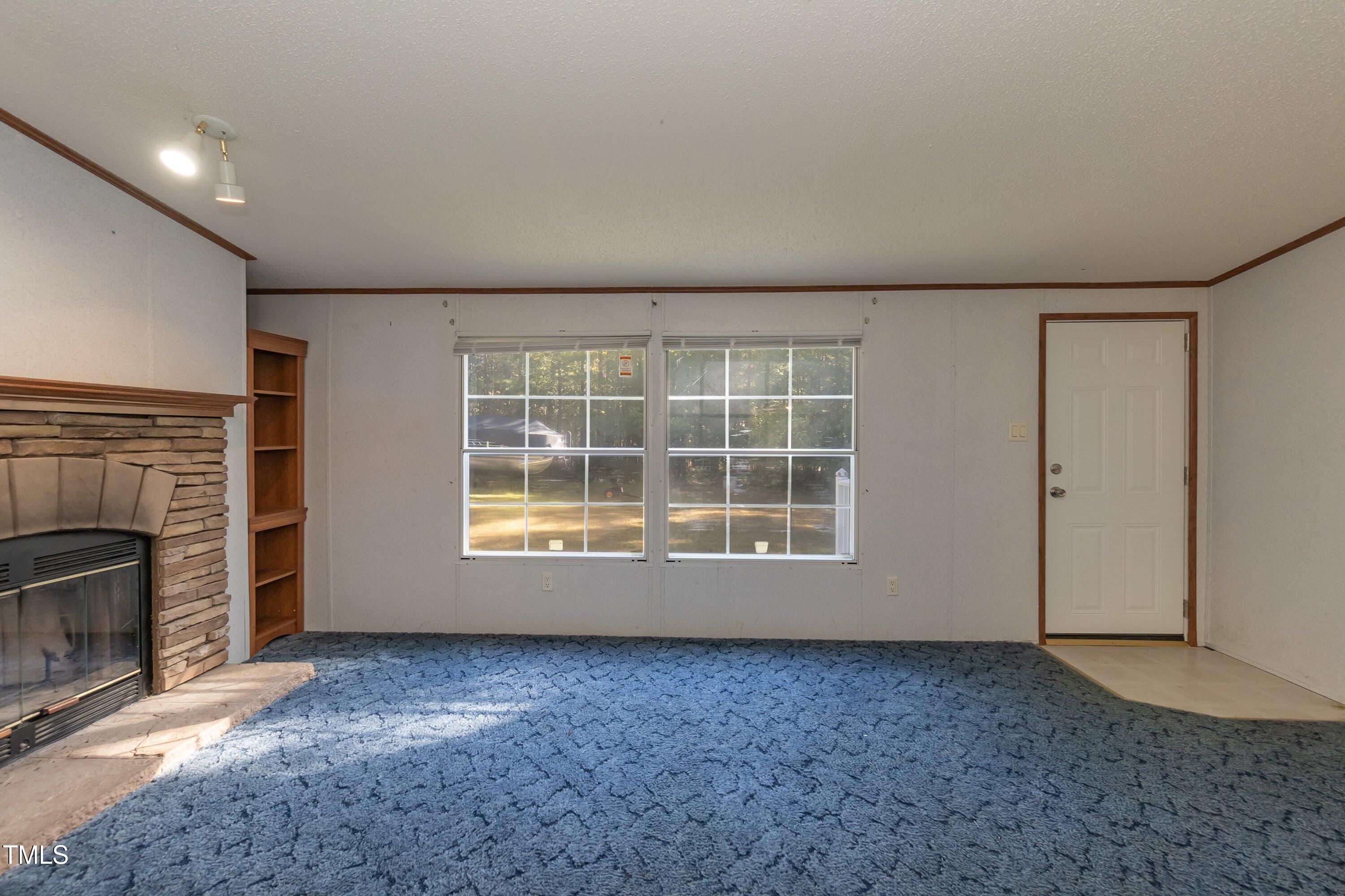 7589 Sam Hall Road Oxford, NC 27565 - Photo 34 of 40 Living 02