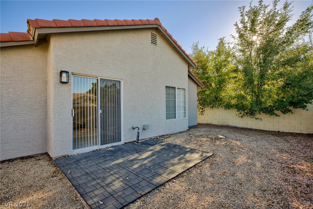2254 Ramsgate Drive Henderson, NV 89074 - Photo 31 of 43 A private backyard oasis awaits with a small patio area for outdoor enjoyment.