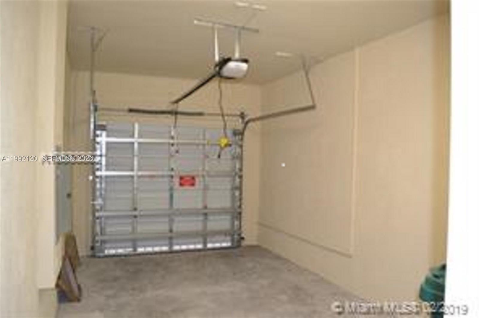 17000 Southwest 90th Terrace Miami, FL 33196 - Photo 41 of 56 a view of a room with racks on the wall