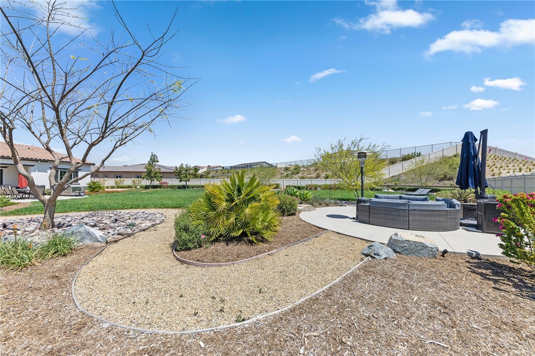7631 Capstone Court Riverside, CA 92506 - Photo 33 of 39 Peaceful backyard setting with multiple areas to relax and entertain.
