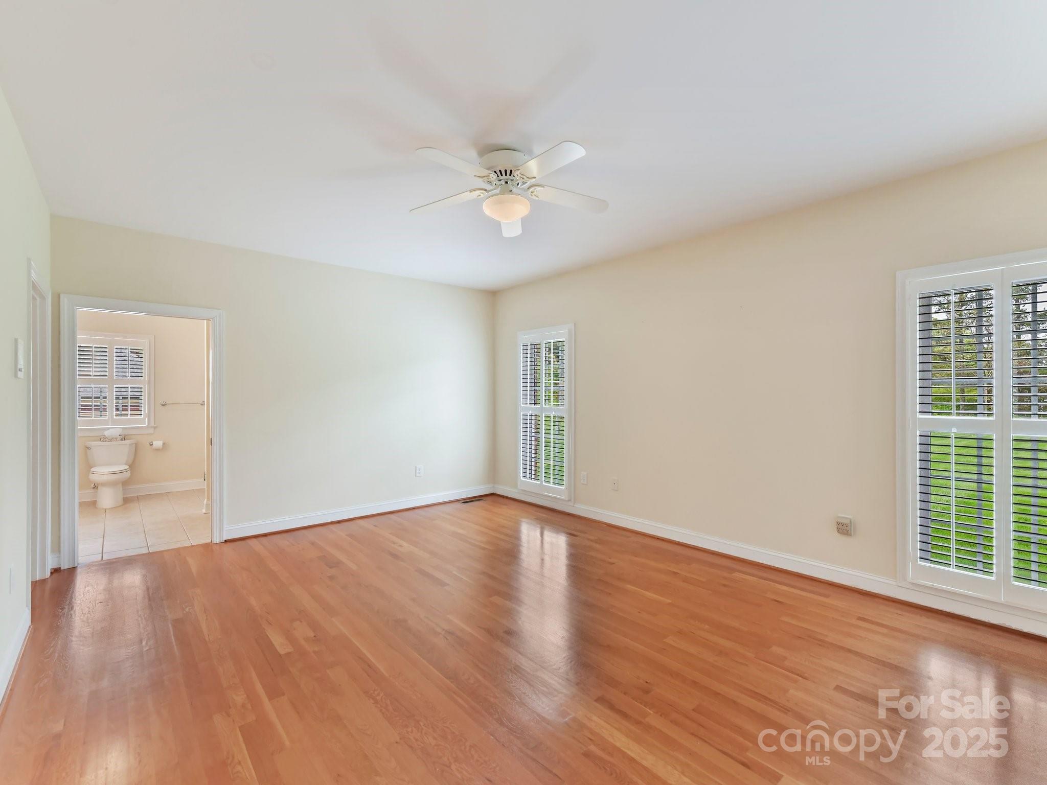 1902 Windmere Drive Monroe, NC 28110 - Photo 22 of 47 wooden floor in an empty room with a window