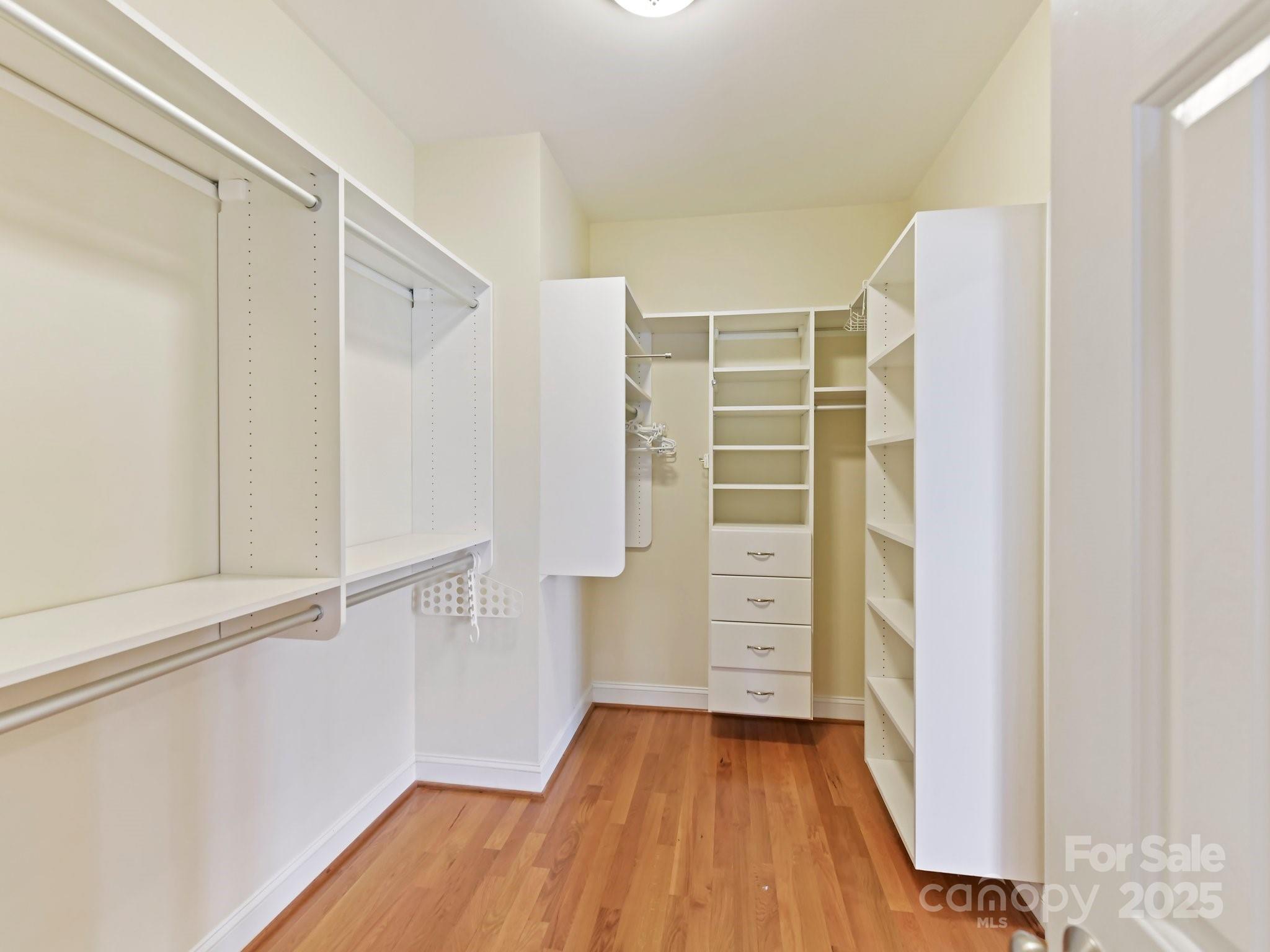 1902 Windmere Drive Monroe, NC 28110 - Photo 23 of 47 a view of walk in closet with empty racks
