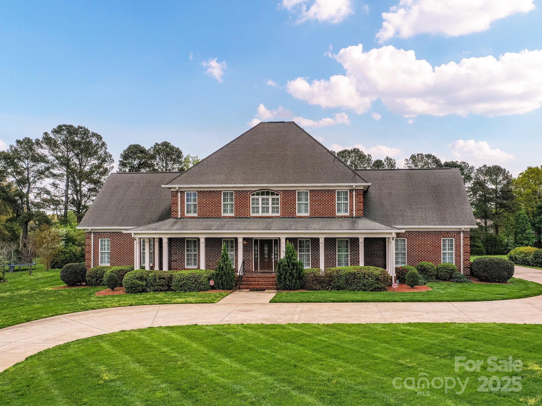 1902 Windmere Drive Monroe, NC 28110 - Photo 3 of 47 a front view of a house with a yard