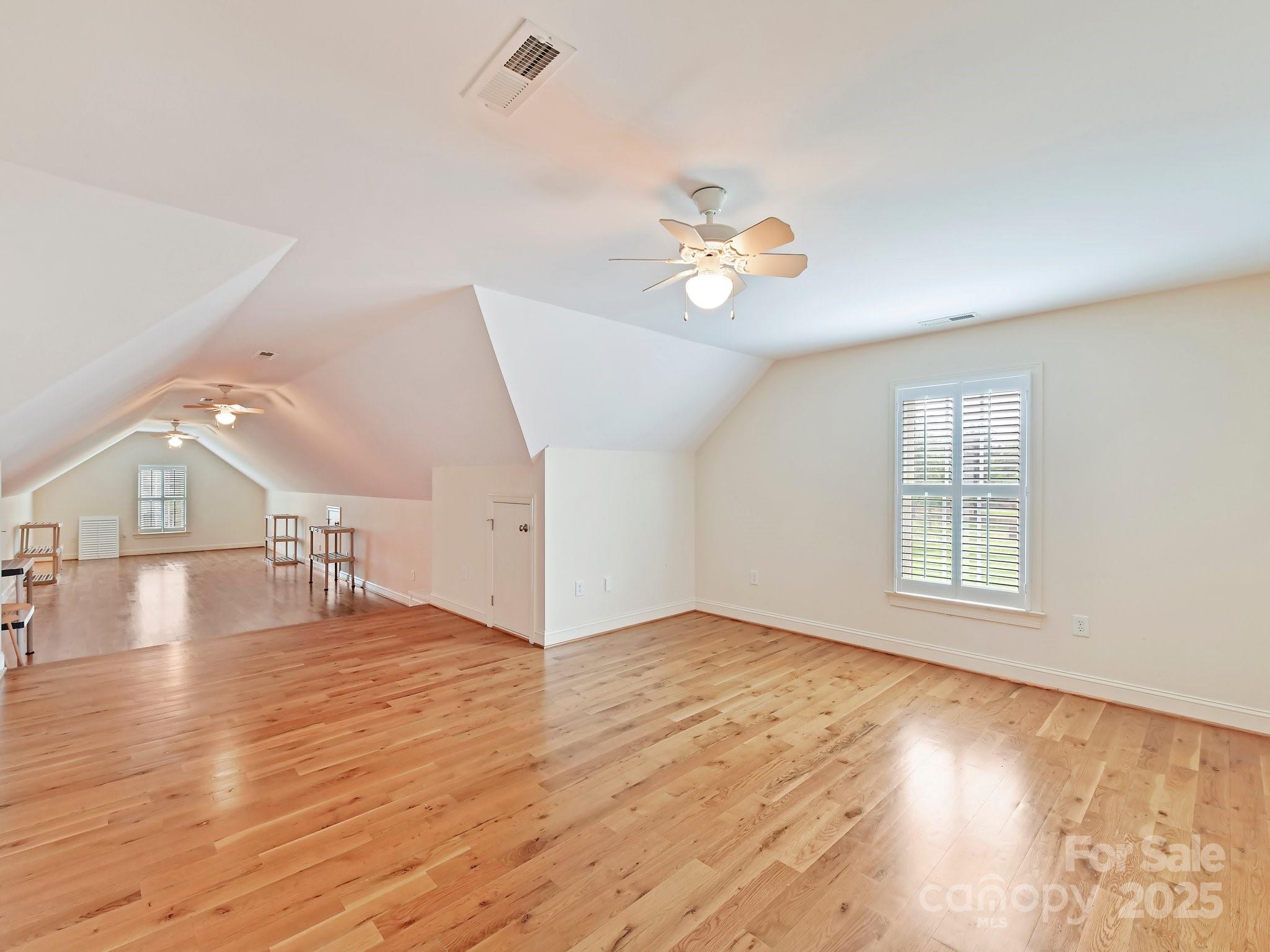 1902 Windmere Drive Monroe, NC 28110 - Photo 38 of 47 wooden floor in an empty room with a window