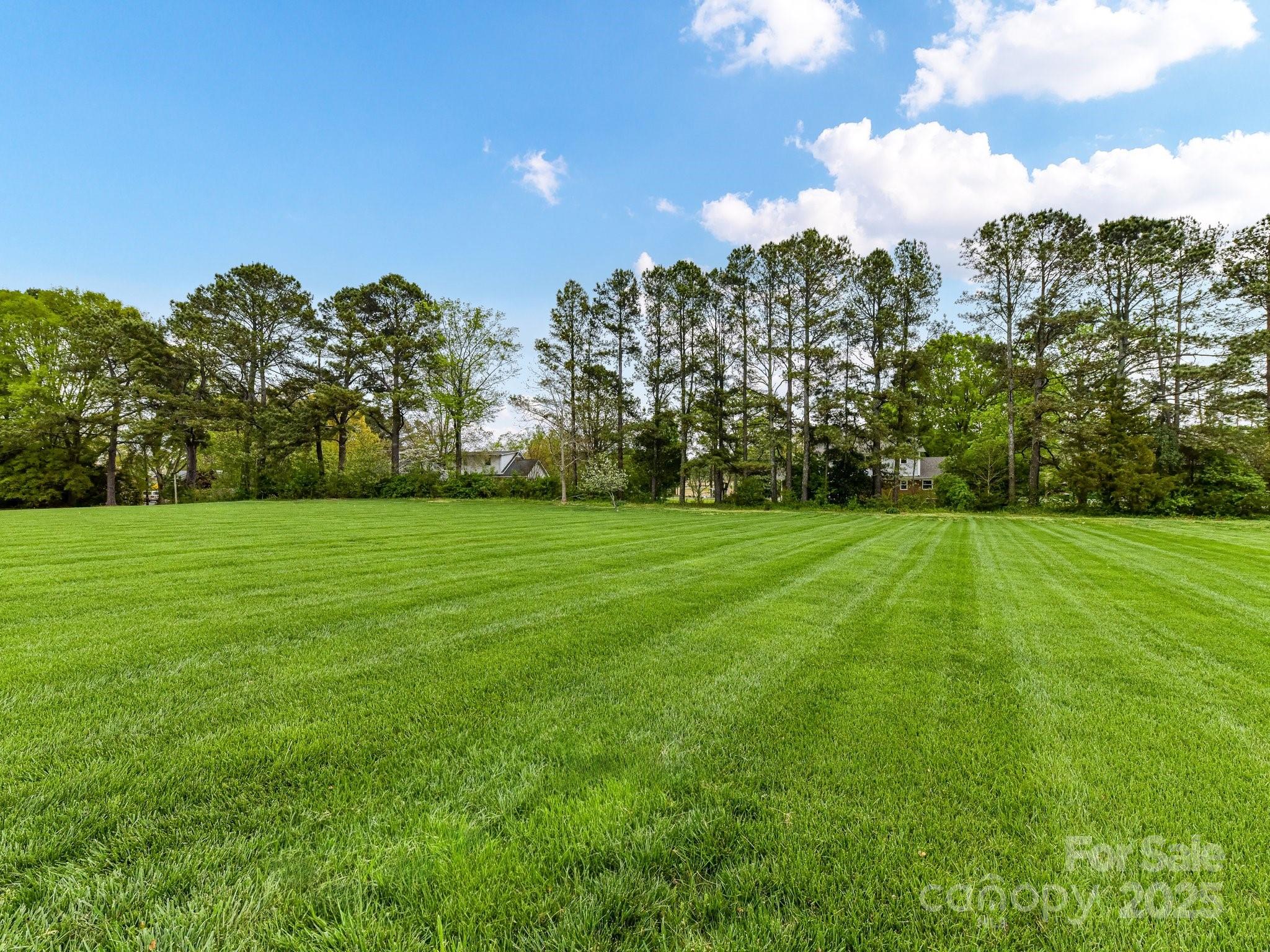 1902 Windmere Drive Monroe, NC 28110 - Photo 41 of 47 a view of a green field