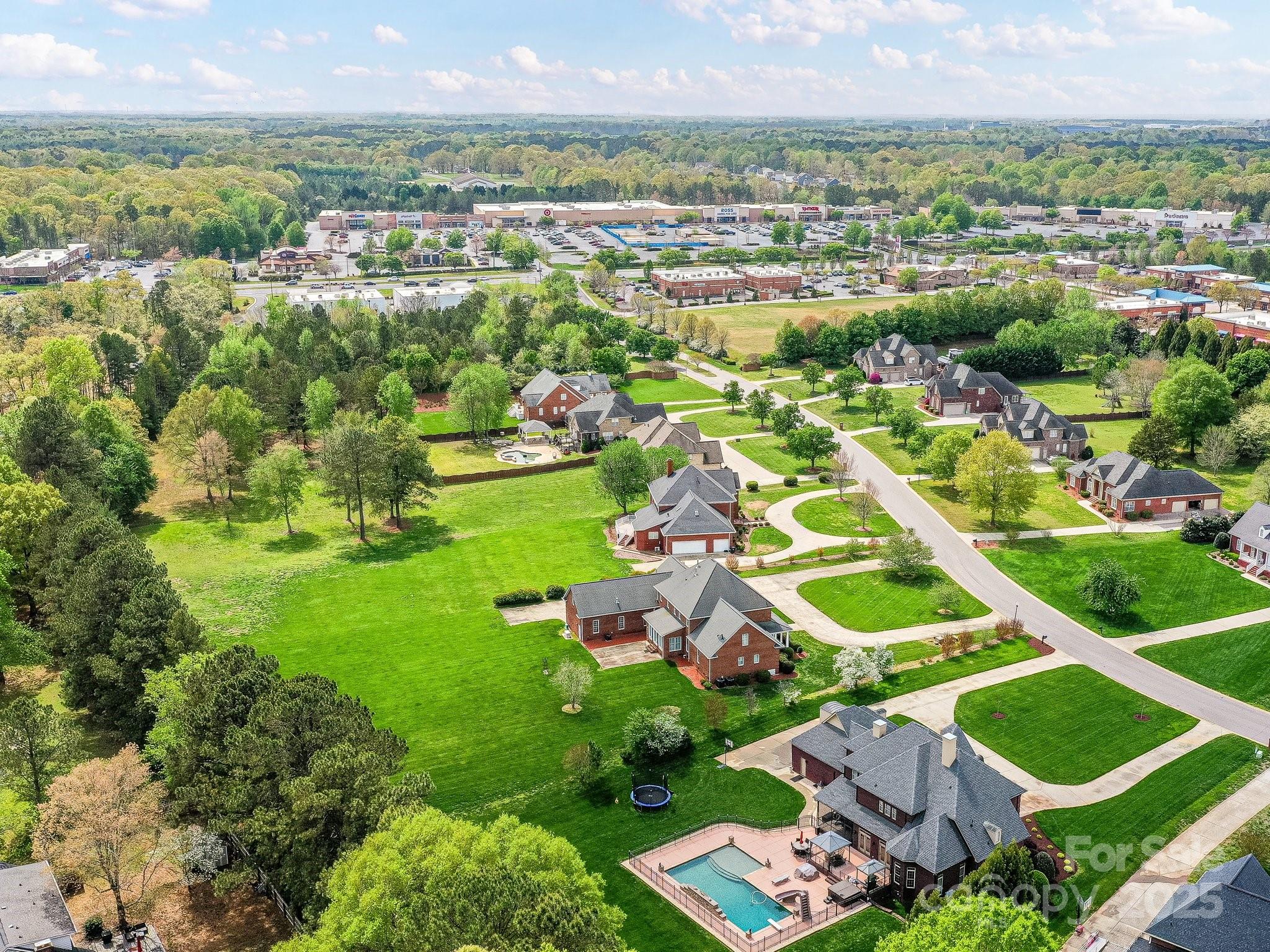 1902 Windmere Drive Monroe, NC 28110 - Photo 45 of 47 an aerial view of residential houses with outdoor space and trees