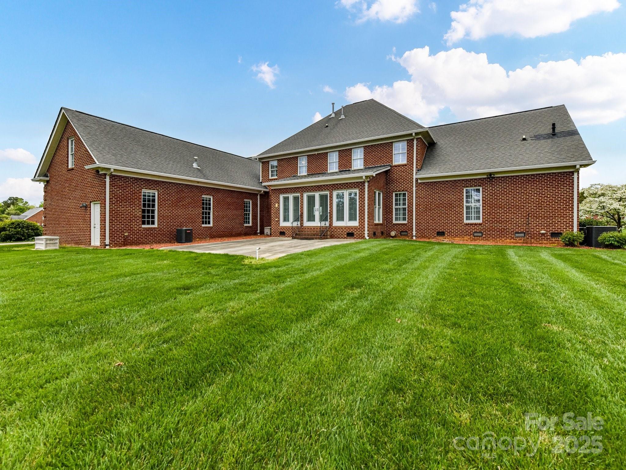 1902 Windmere Drive Monroe, NC 28110 - Photo 6 of 47 a big house with a big yard and more windows