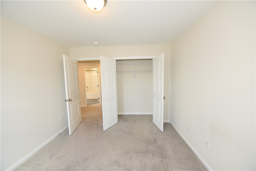 122 Bellflower Lane Anderson, SC 29625 - Photo 22 of 32 This spacious bedroom offers comfortable carpeting and a convenient closet for easy storage.