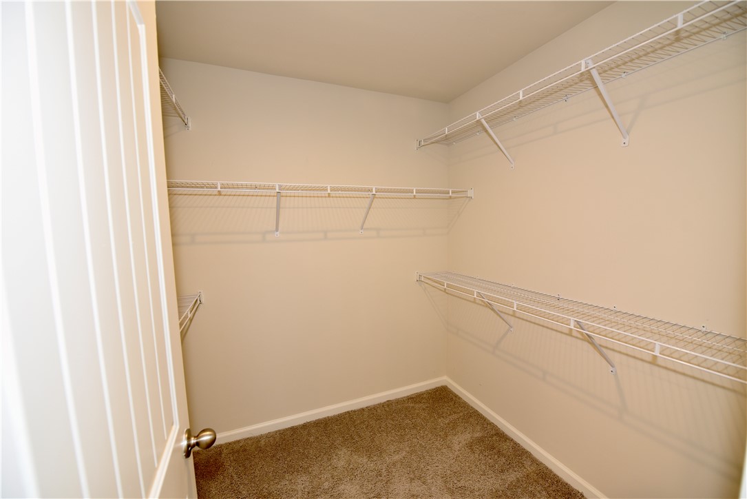 122 Bellflower Lane Anderson, SC 29625 - Photo 29 of 32 This spacious walk-in closet offers ample storage with convenient wire shelving.
