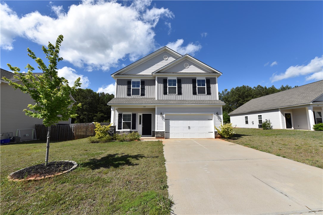 122 Bellflower Lane Anderson, SC 29625 - Photo 32 of 32 This classic two-story home features a well-maintained exterior and inviting curb appeal.