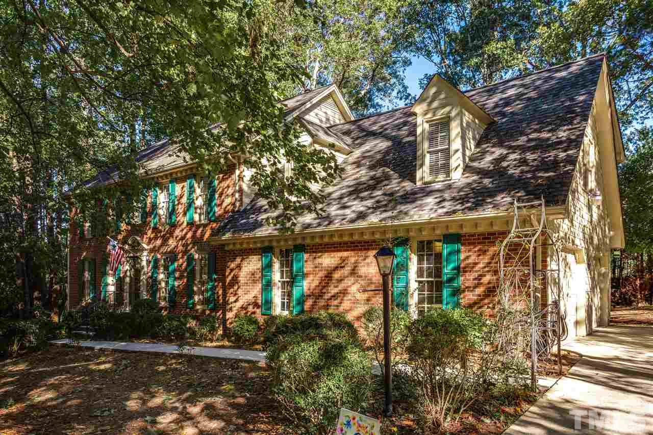 620 Downpatrick Lane Raleigh, NC 27615 - Photo 1 of 23 front view of a house with a tree