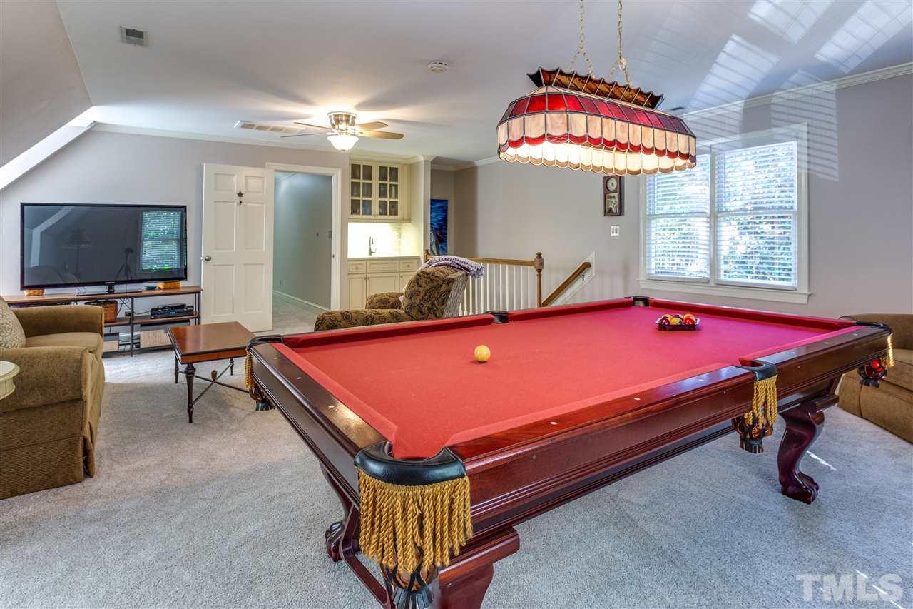 620 Downpatrick Lane Raleigh, NC 27615 - Photo 15 of 23 a room with pool table and windows