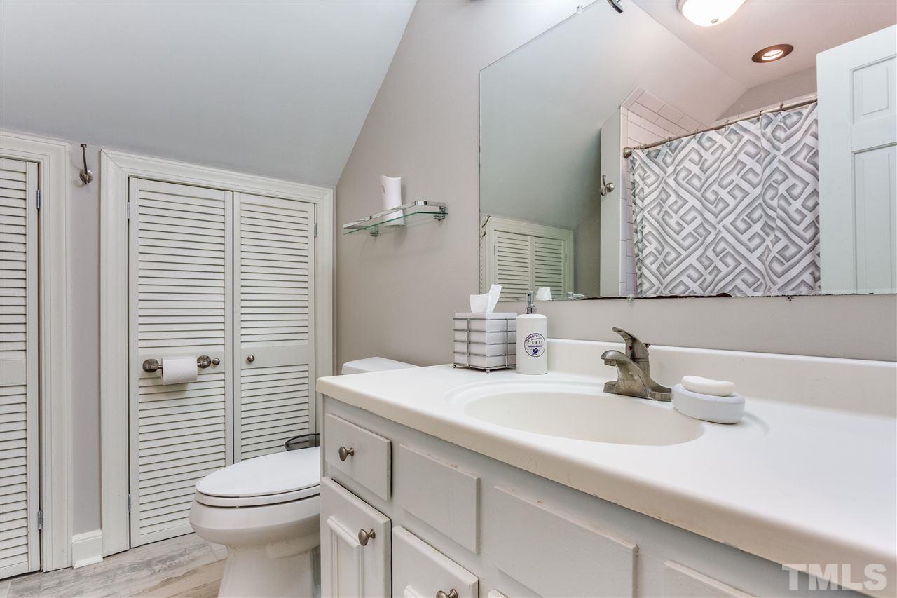 620 Downpatrick Lane Raleigh, NC 27615 - Photo 22 of 23 a bathroom with a sink a toilet and shower