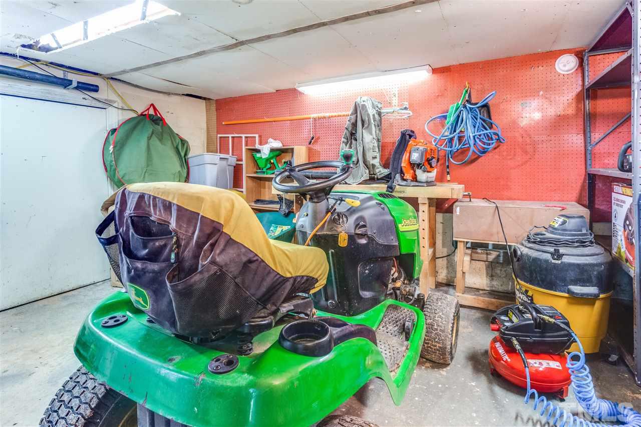 620 Downpatrick Lane Raleigh, NC 27615 - Photo 23 of 23 a view of a children toys back of the house
