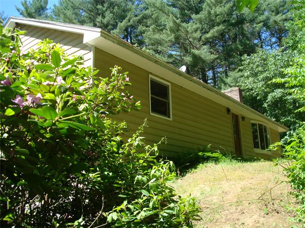 159 Old Sunderland Road Montague, MA 01351 - Photo 1 of 14 a backyard of a house