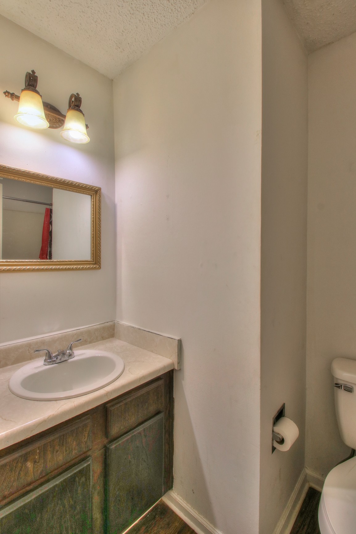 221 Warrior Road Madison, TN 37115 - Photo 11 of 13 a bathroom with a sink toilet and mirror