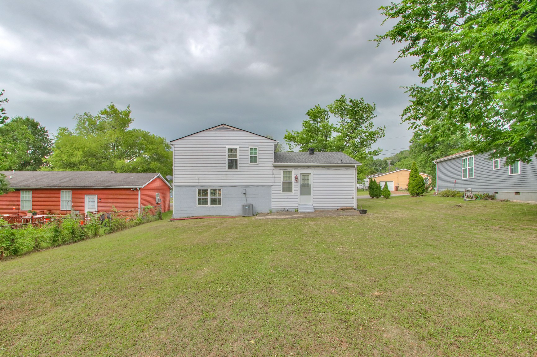 221 Warrior Road Madison, TN 37115 - Photo 12 of 13 front view of a house with a yard