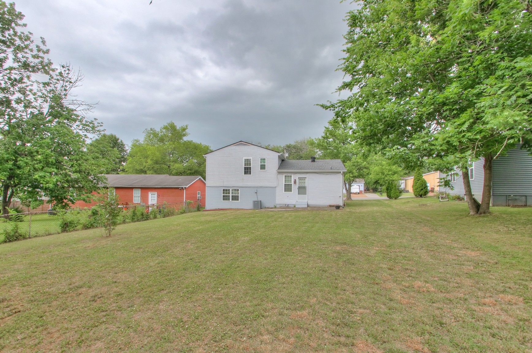 221 Warrior Road Madison, TN 37115 - Photo 13 of 13 a front view of a house with garden