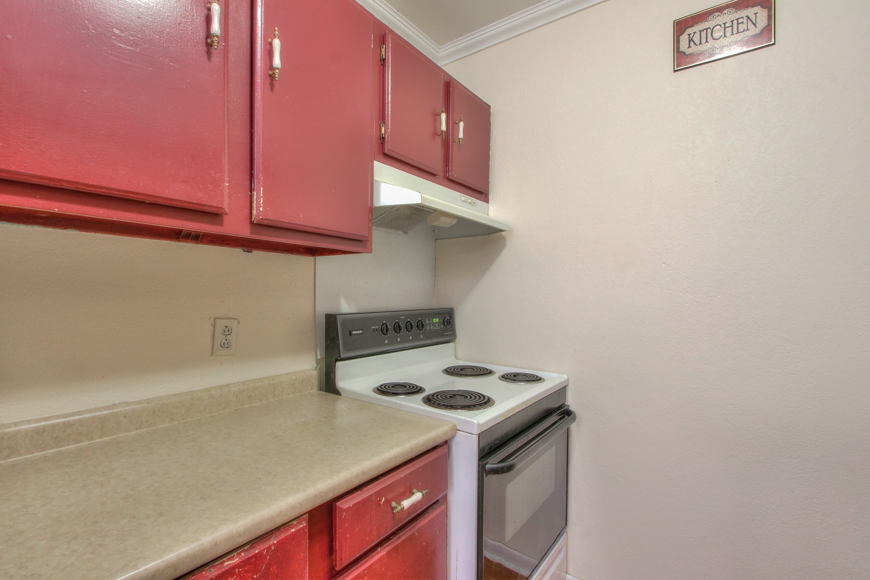 221 Warrior Road Madison, TN 37115 - Photo 7 of 13 a kitchen with a sink cabinets and a wooden floor
