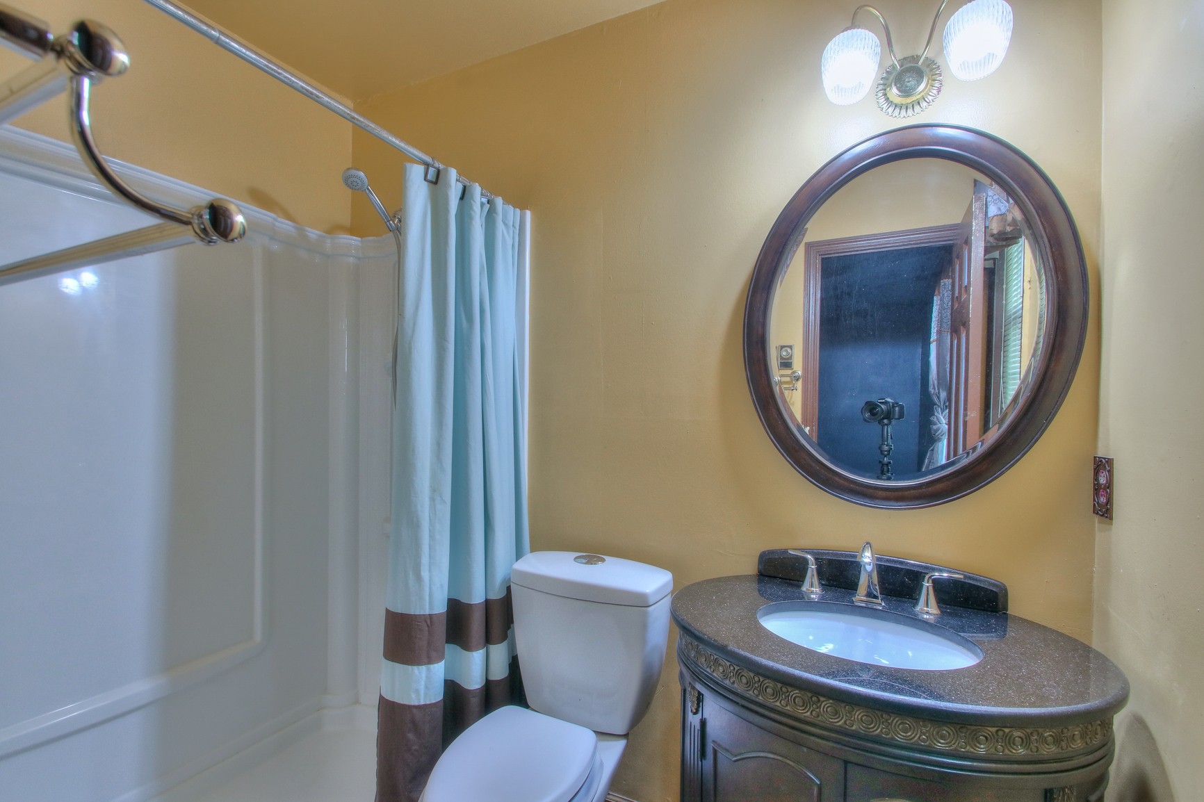 221 Warrior Road Madison, TN 37115 - Photo 9 of 13 a bathroom with a sink and a mirror