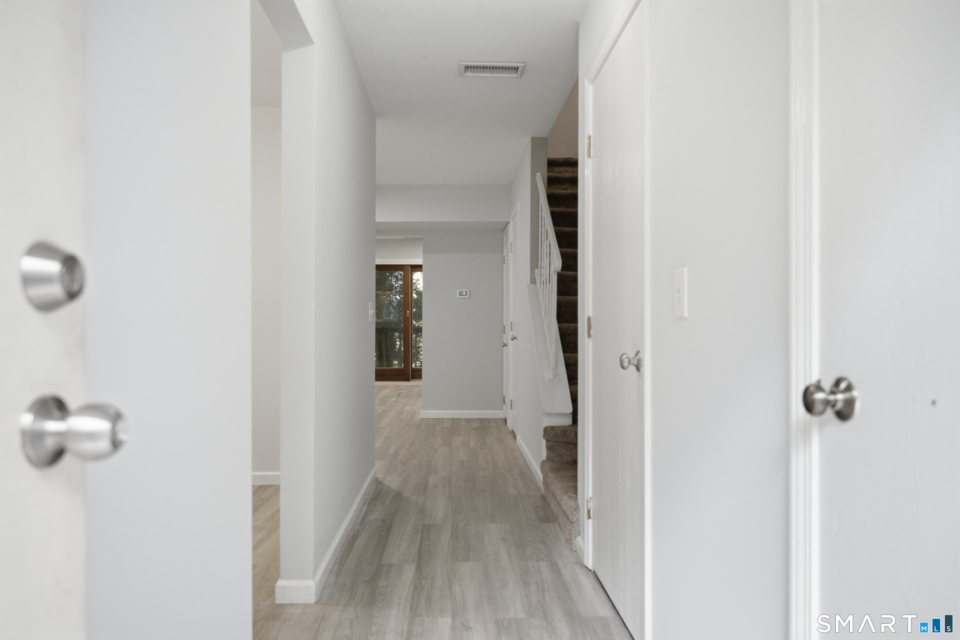 25 Padanaram Road, Unit 66 Danbury, CT 06811 - Photo 5 of 19 Half bath to the Right