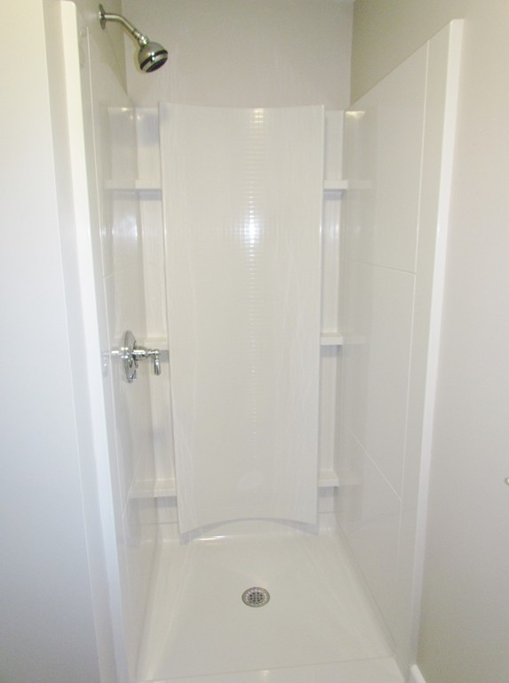 185 First Parish Road Scituate, MA 02066 - Photo 16 of 28 a bathroom with a shower