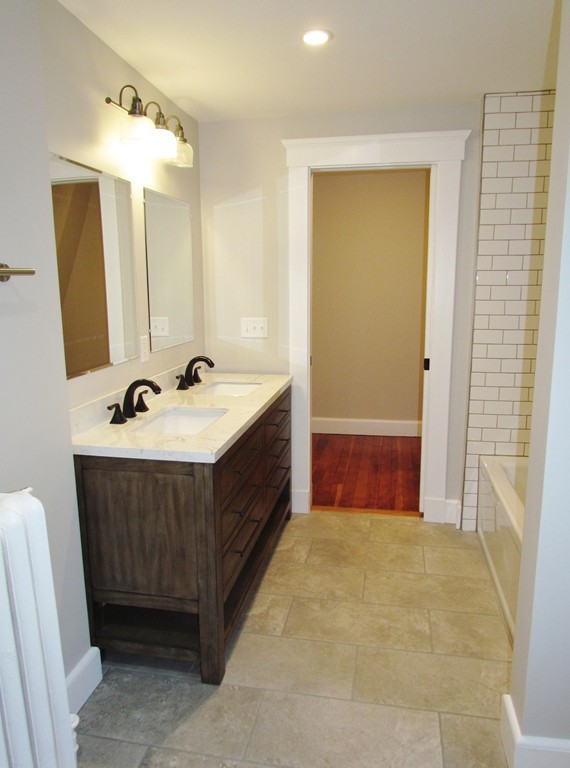 185 First Parish Road Scituate, MA 02066 - Photo 22 of 28 a bathroom with a sink and a mirror