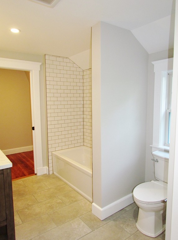 185 First Parish Road Scituate, MA 02066 - Photo 23 of 28 a bathroom with a toilet and a bathtub