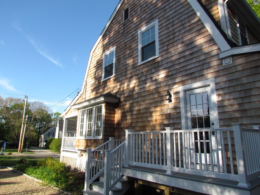 185 First Parish Road Scituate, MA 02066 - Photo 26 of 28 a view of a house with a yard