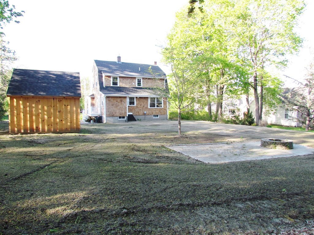 185 First Parish Road Scituate, MA 02066 - Photo 28 of 28 a front view of a house with a yard