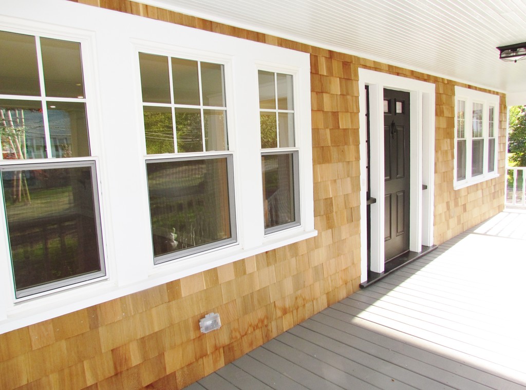 185 First Parish Road Scituate, MA 02066 - Photo 4 of 28 a view of front door of house with wooden floor and windows