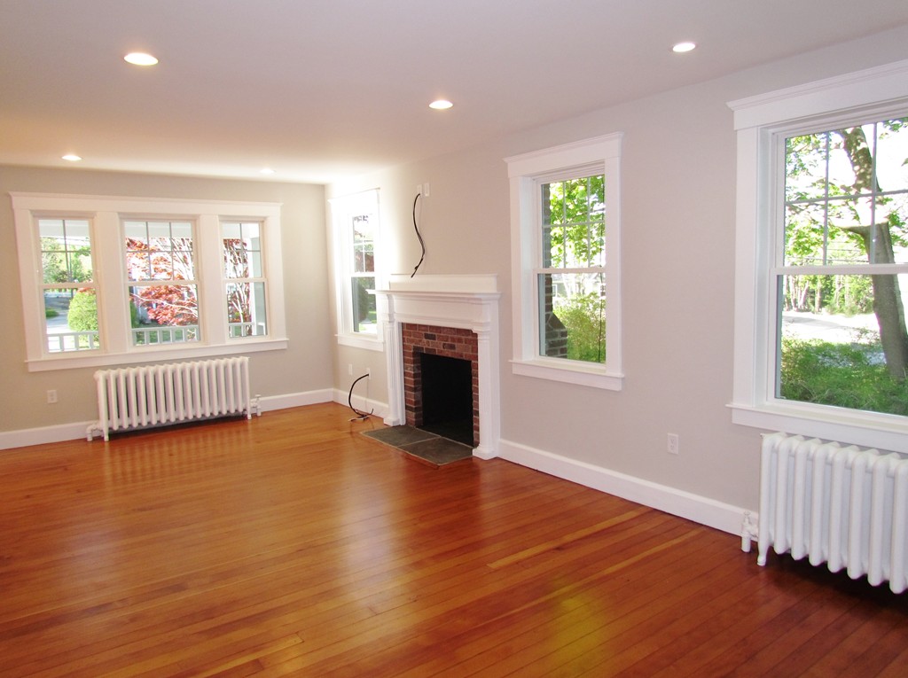 185 First Parish Road Scituate, MA 02066 - Photo 7 of 28 a view of an empty room with wooden floor and a window