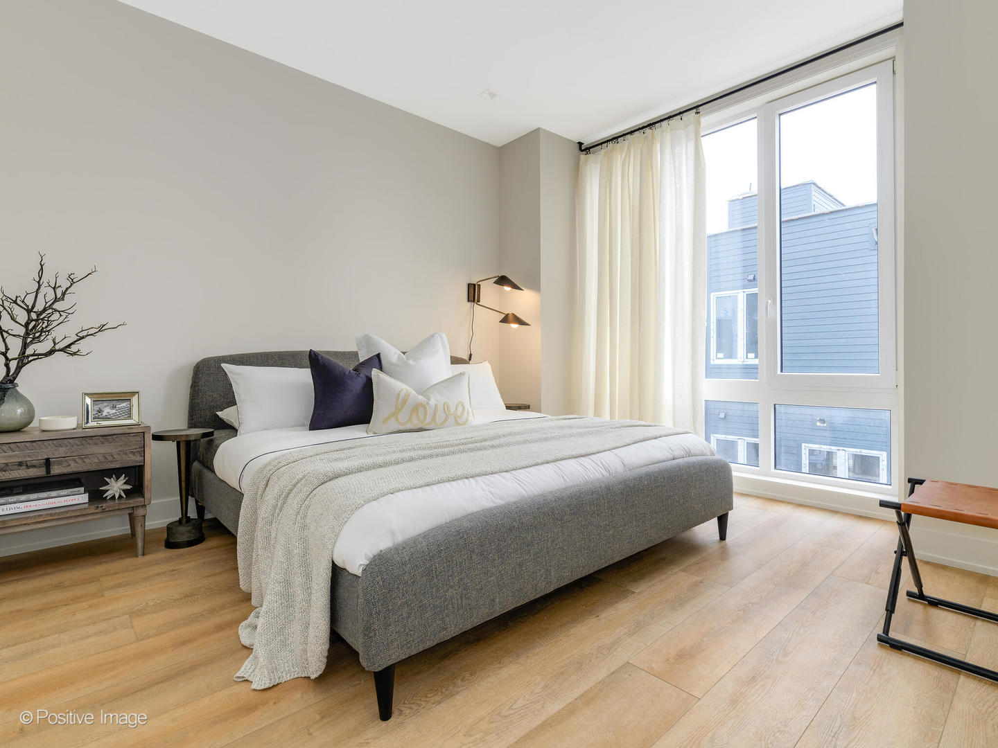 3205 North Kildare Avenue Chicago, IL 60641 - Photo 23 of 33 a bedroom with a bed and a large window