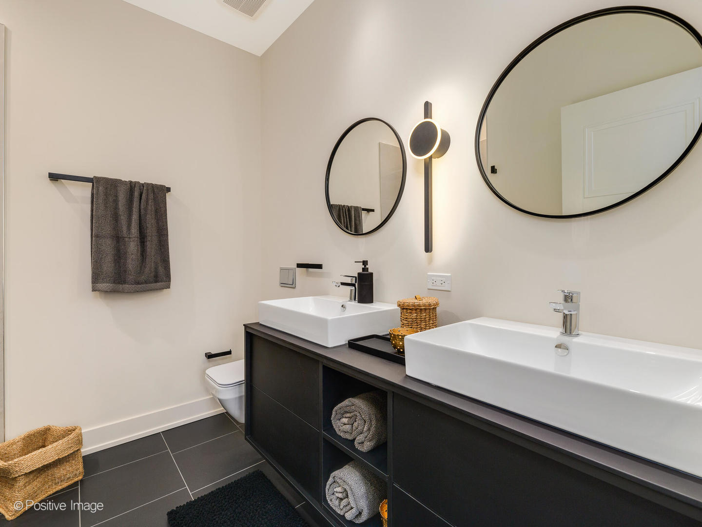 3205 North Kildare Avenue Chicago, IL 60641 - Photo 24 of 33 a bathroom with a sink and a mirror