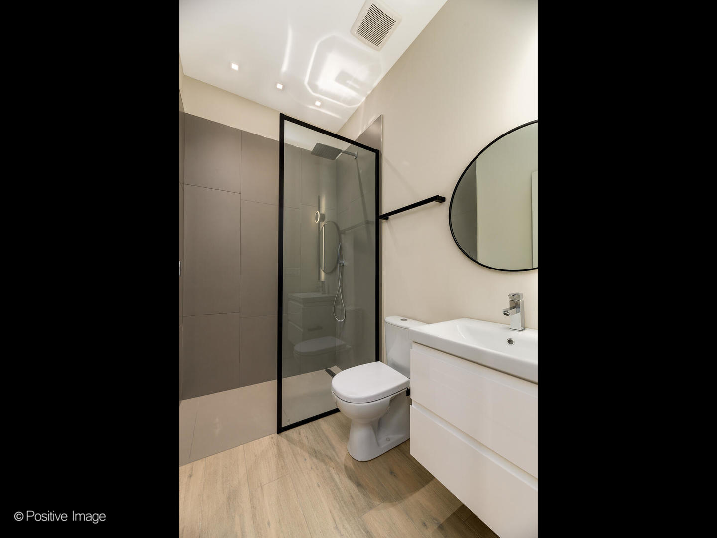 3205 North Kildare Avenue Chicago, IL 60641 - Photo 32 of 33 a bathroom with a toilet sink and a mirror