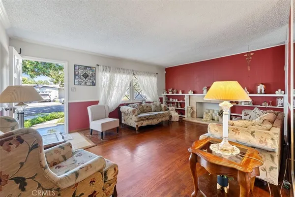 a living room with furniture and window