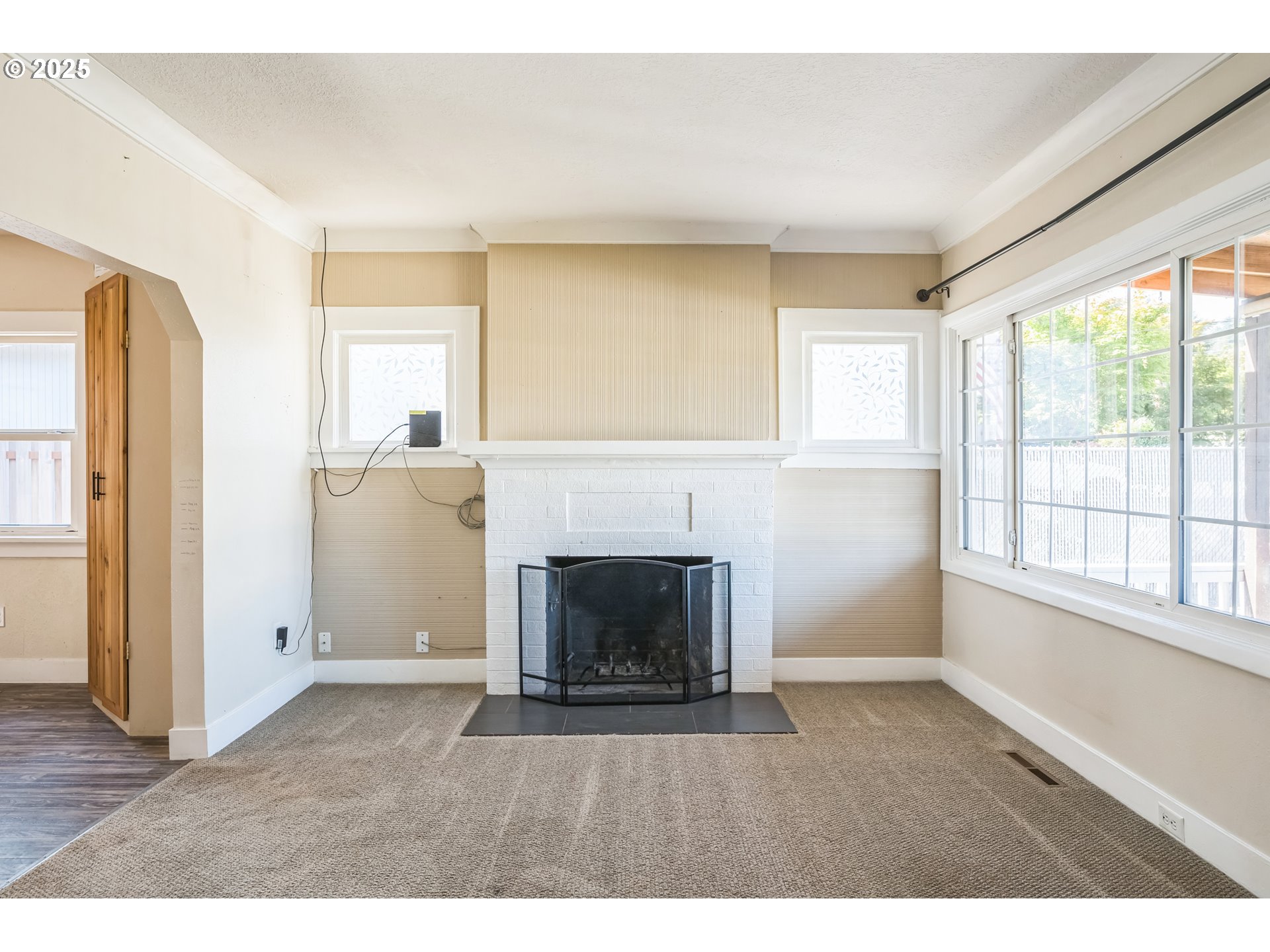 420 Southeast Linden Avenue Gresham, OR 97080 - Photo 16 of 30 a living room with furniture and a fireplace