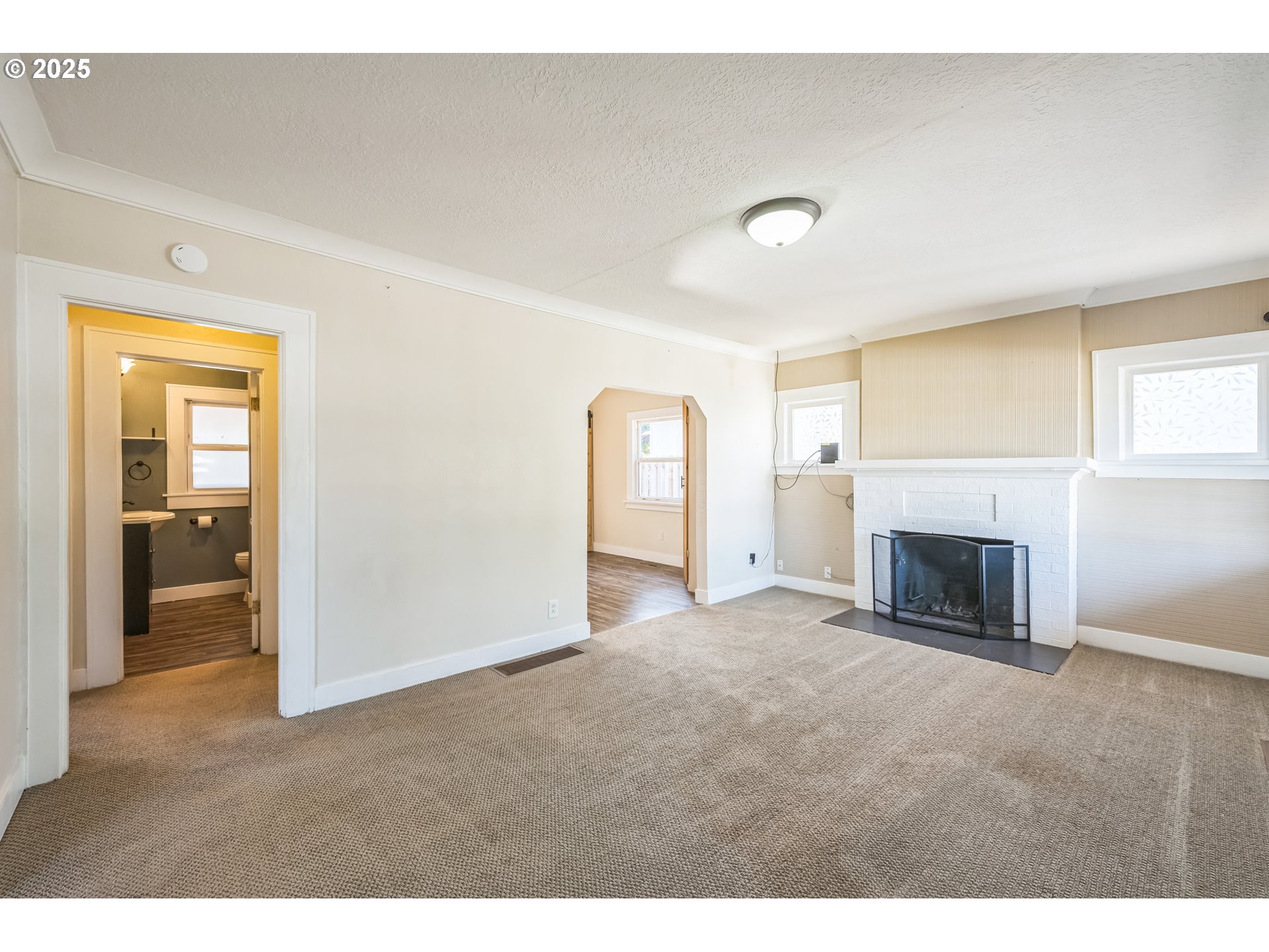 420 Southeast Linden Avenue Gresham, OR 97080 - Photo 20 of 30 a view of empty room with a fireplace