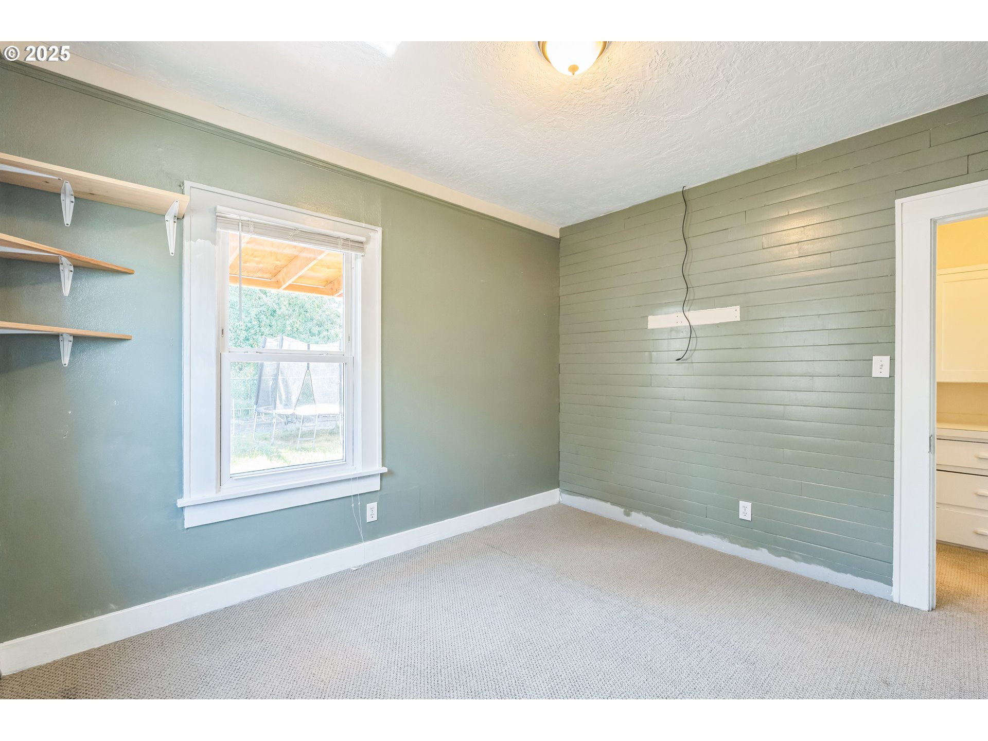 420 Southeast Linden Avenue Gresham, OR 97080 - Photo 24 of 30 a view of an empty room with a window