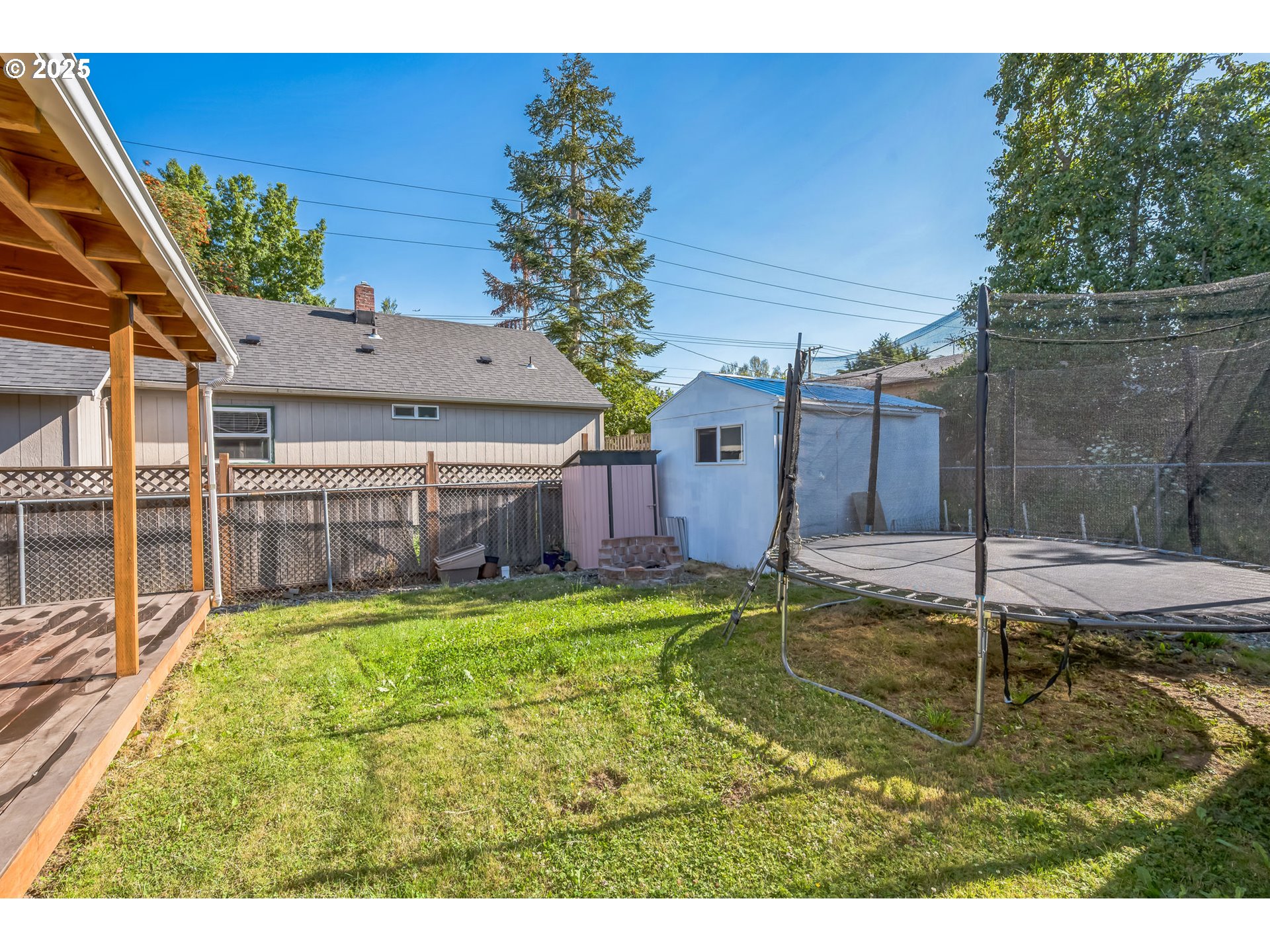 420 Southeast Linden Avenue Gresham, OR 97080 - Photo 6 of 30 a swimming pool with yard and outdoor seating