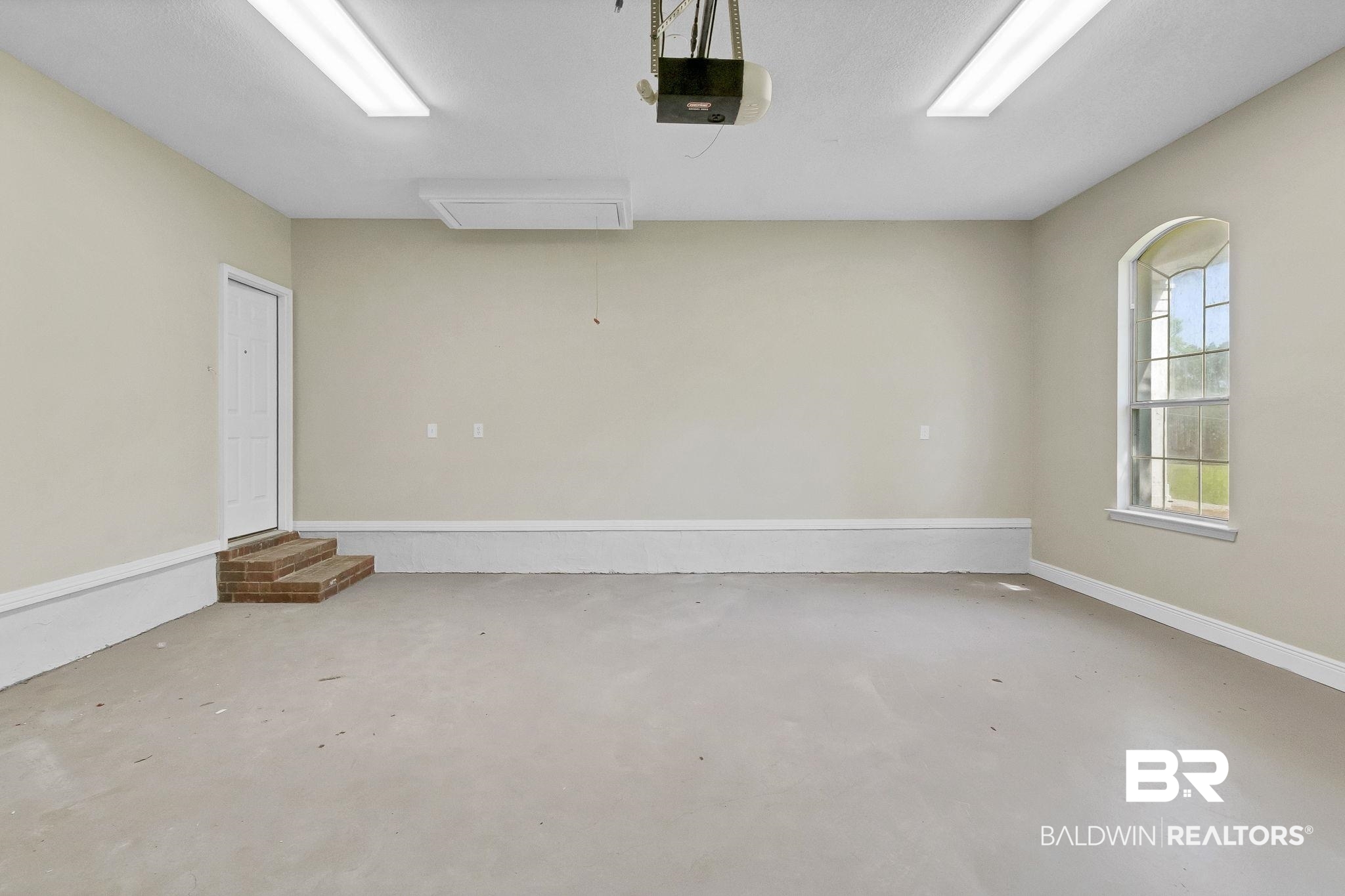 20265 Erin Pond Road Seminole, AL 36574 - Photo 67 of 97 Garage featuring a garage door opener
