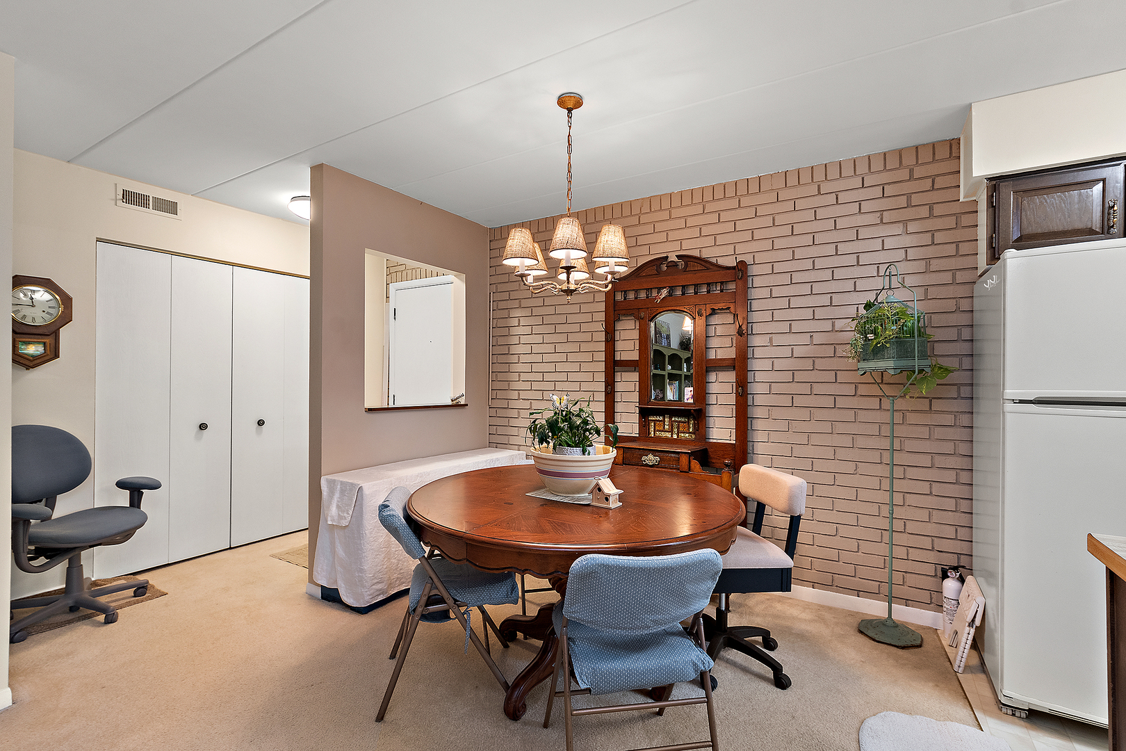 1940 183rd Street, Unit 1C Homewood, IL 60430 - Photo 3 of 16 a dining room with furniture and window