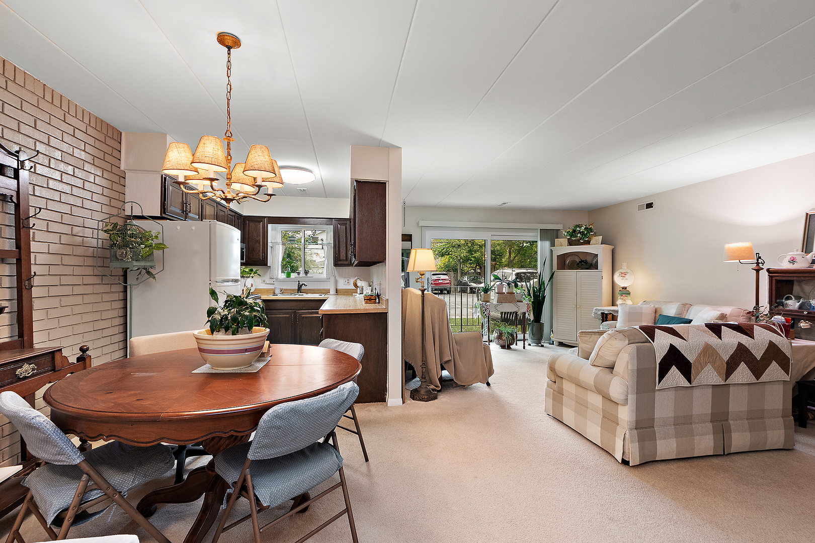 1940 183rd Street, Unit 1C Homewood, IL 60430 - Photo 5 of 16 a view of a dining room with furniture window and outside view