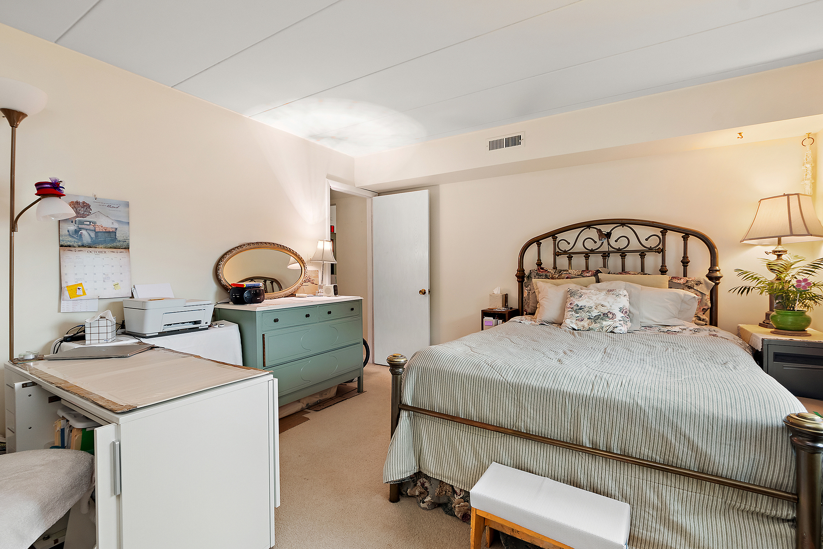 1940 183rd Street, Unit 1C Homewood, IL 60430 - Photo 10 of 16 a bedroom with a bed and a dresser in it