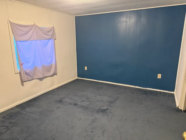 an empty room with closet