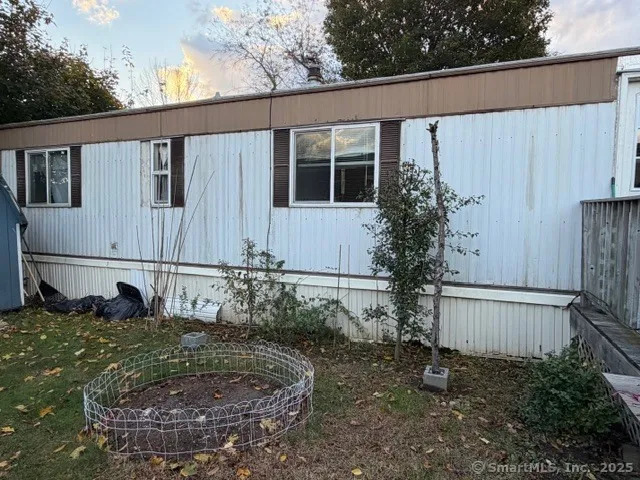 a view of deck with table and chairs