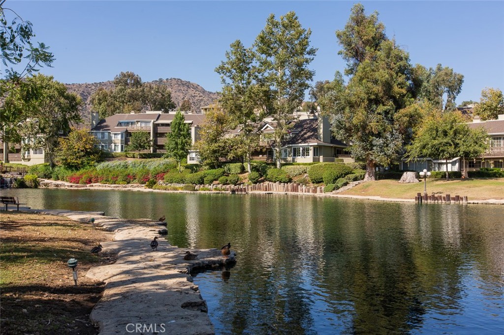 1053 Lakeview Terrace Azusa, CA 91702 - Photo 1 of 1 a view of a lake with a house in the background