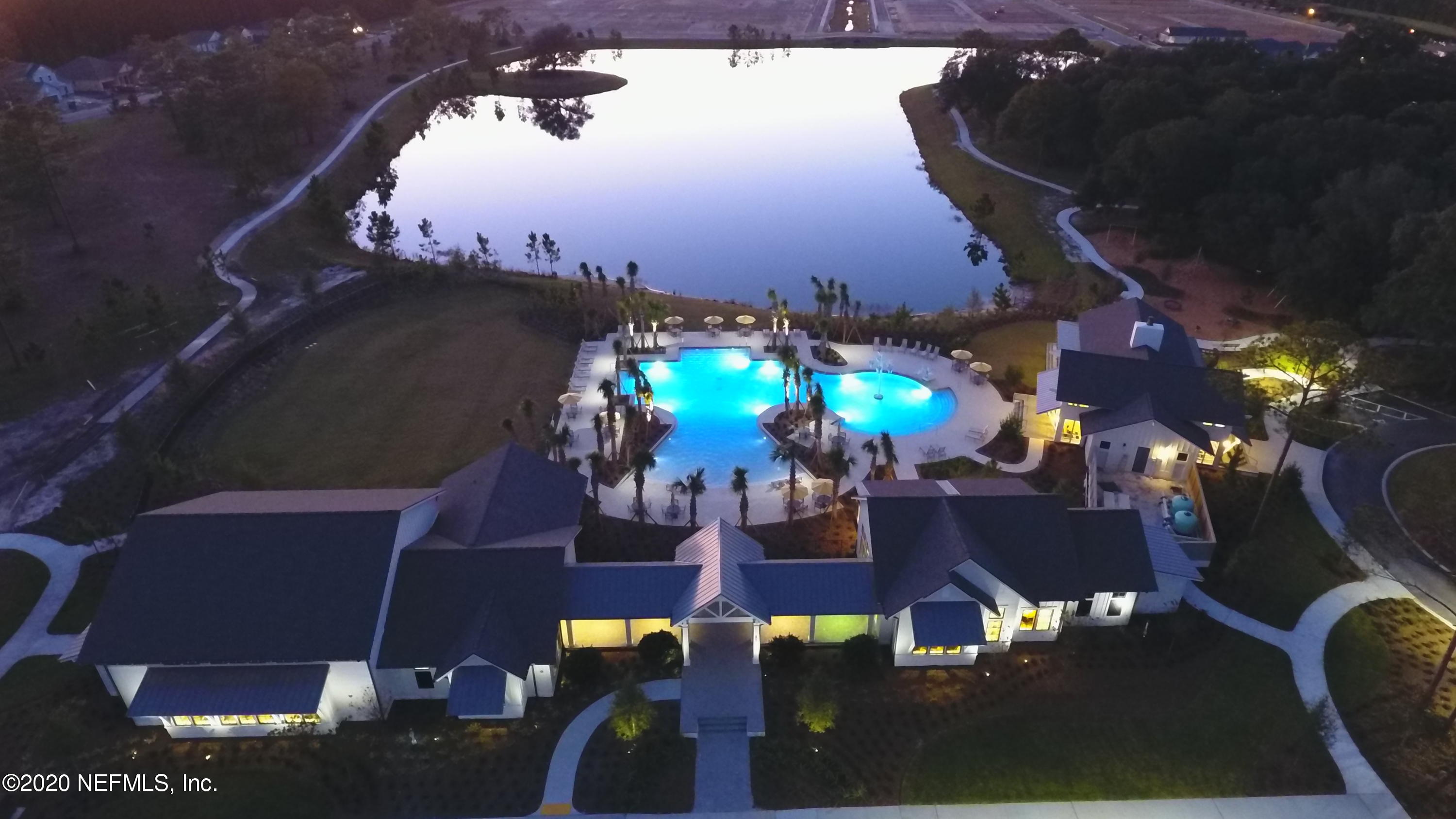 586 Rustic Mill Dr Street St. Augustine, FL 32092 - Photo 28 of 29 25 - TM Clubhouse at dusk