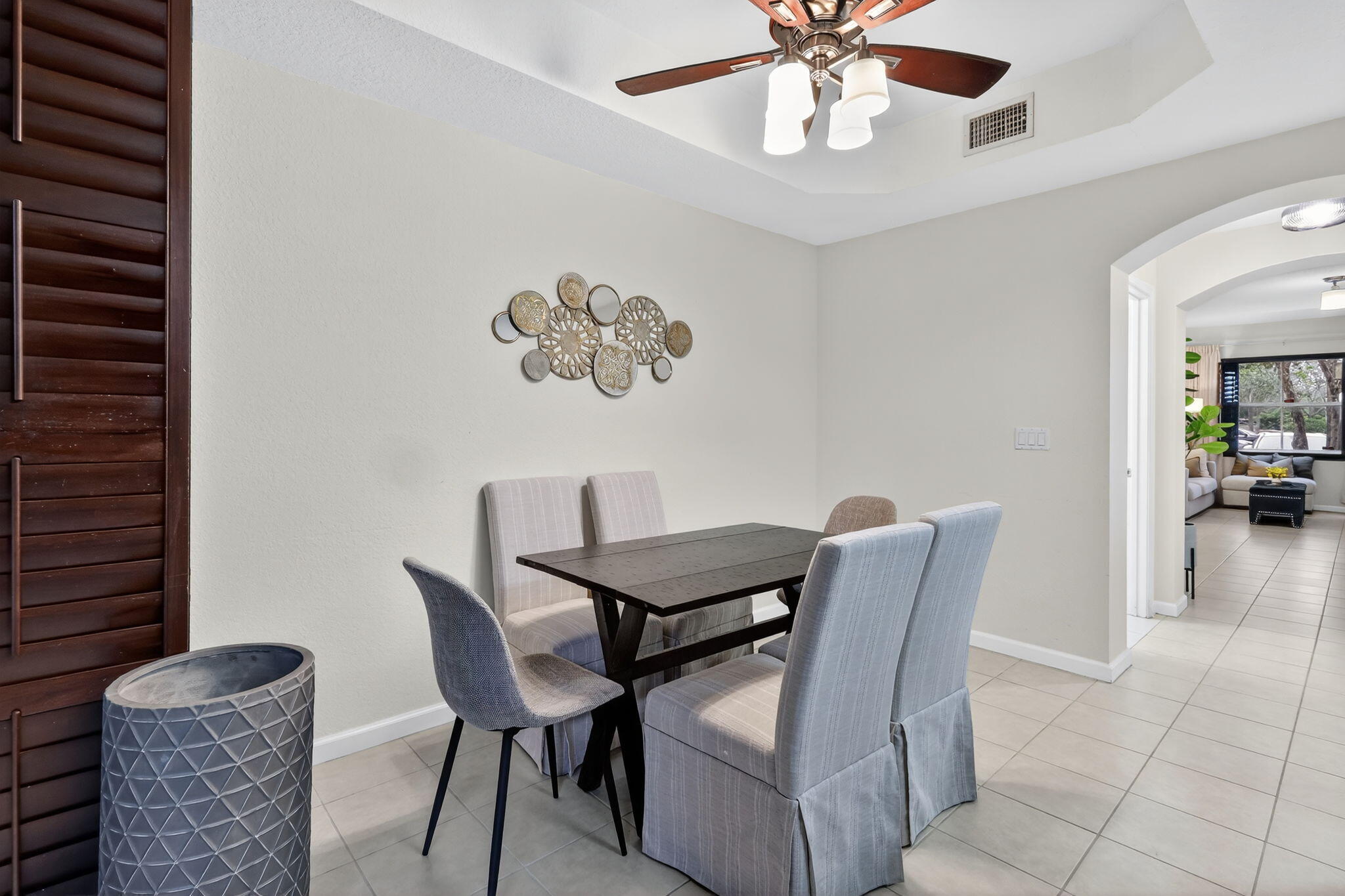 2931 Hope Valley Street, Unit 405 West Palm Beach, FL 33411 - Photo 14 of 35 a view of a dining room with furniture